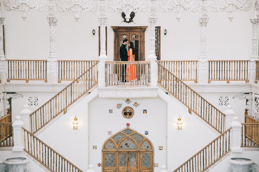 Prewedding indian in wedding dress panorama staircase