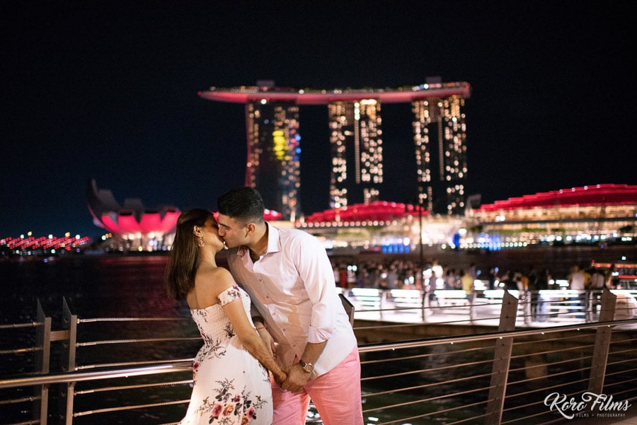 Prewedding in Singapore Marina Bay Sands night time couple kiss dark