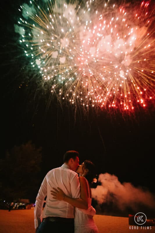 Western Wedding Kiss in the middle of the fireworks at night