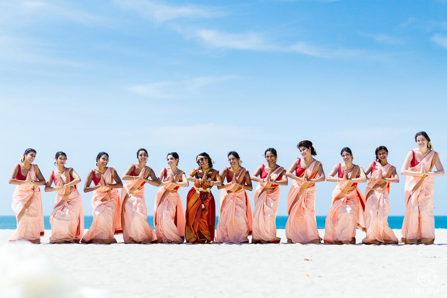 Indian wedding Bride and group friends at the sea