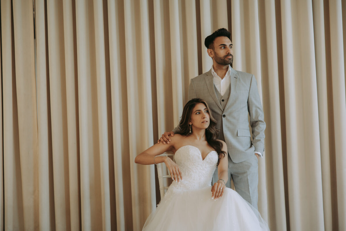 Couple laughing together during their Benedict Studio pre wedding session in Bangkok